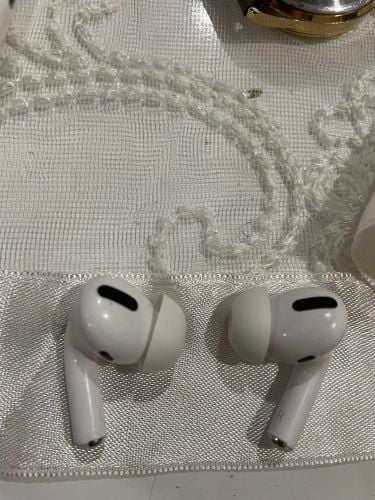 Two AirPods without the box